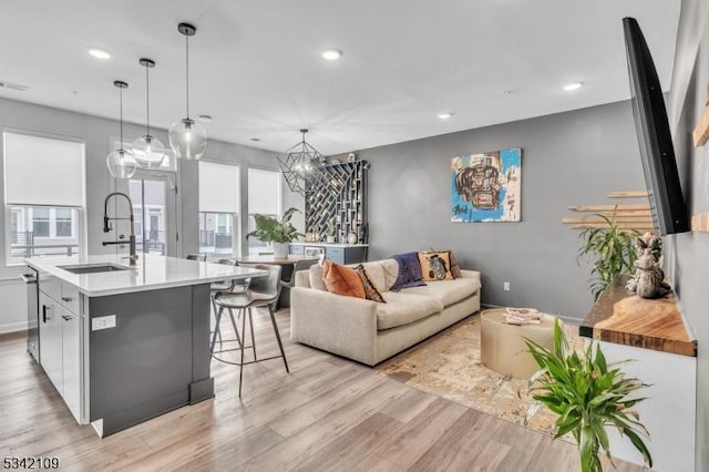 interior space with visible vents, light wood-style flooring, and recessed lighting