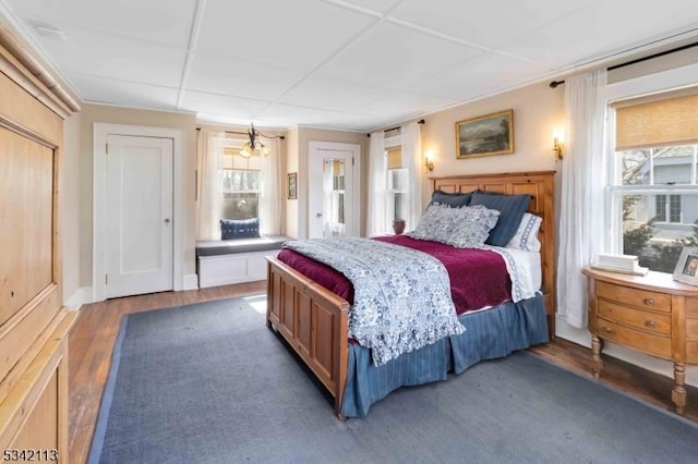 bedroom with wood finished floors