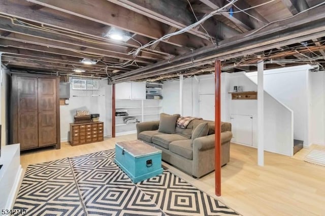 basement with light wood-style flooring