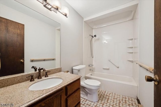 bathroom with toilet, shower / washtub combination, and vanity