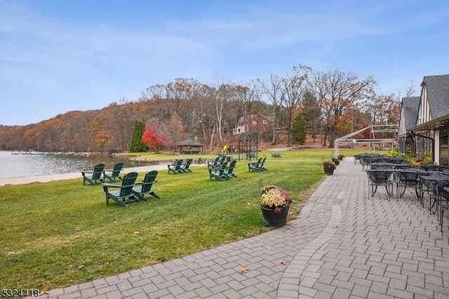 view of patio featuring a water view