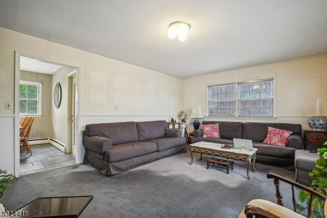 living area with a baseboard radiator and carpet flooring