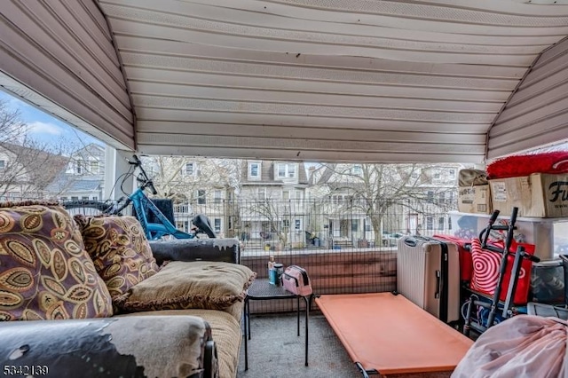 sunroom with lofted ceiling