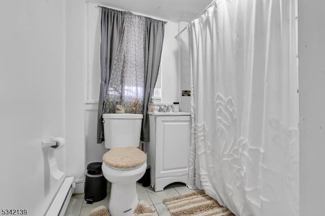 full bathroom with tile patterned floors, curtained shower, toilet, and a baseboard heating unit