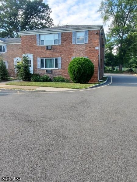 view of front of property with brick siding