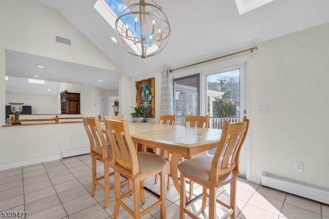 dining space with a skylight, visible vents, a baseboard heating unit, and a notable chandelier