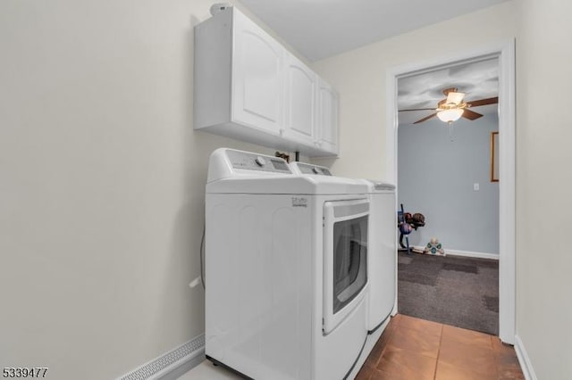 laundry room with ceiling fan, baseboards, independent washer and dryer, cabinet space, and tile patterned floors