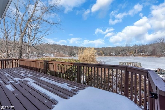 view of snow covered deck