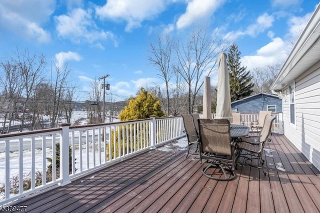 deck featuring outdoor dining space