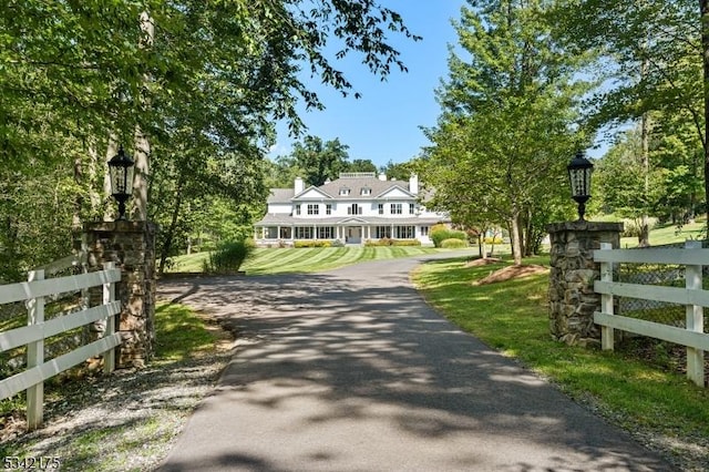 exterior space with street lighting and aphalt driveway