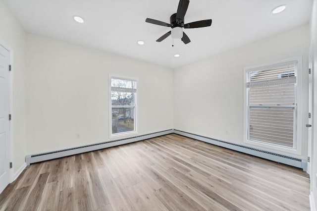 empty room with recessed lighting, ceiling fan, and wood finished floors