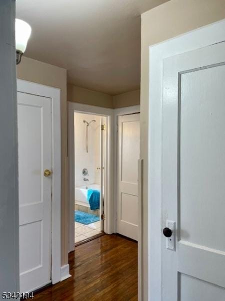 hall featuring wood finished floors