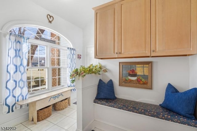 mudroom featuring light tile patterned flooring