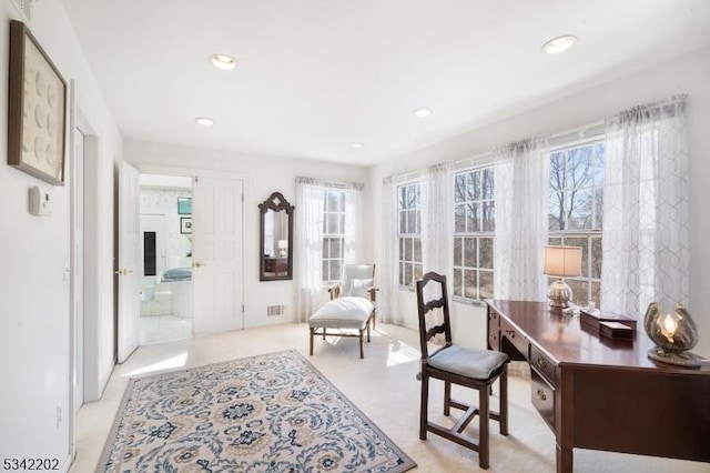 sitting room featuring visible vents and recessed lighting