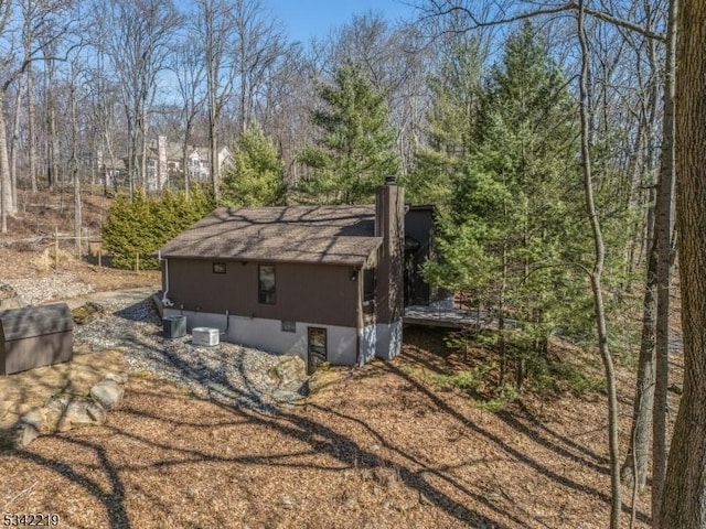 exterior space featuring a chimney