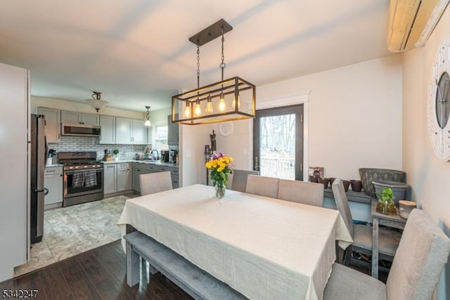 dining room featuring dark wood-style floors