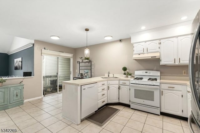 kitchen with white appliances, a peninsula, under cabinet range hood, white cabinetry, and a sink