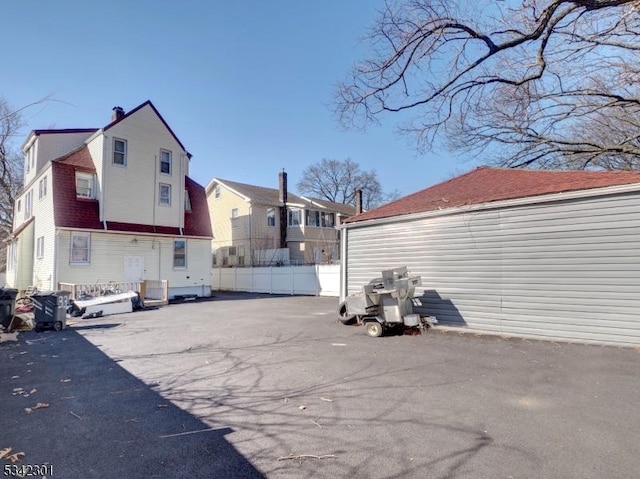 view of car parking with fence