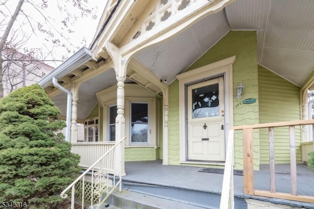 entrance to property with covered porch