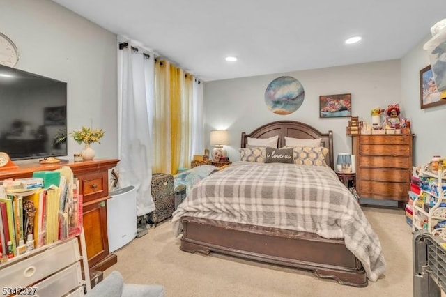 carpeted bedroom featuring recessed lighting