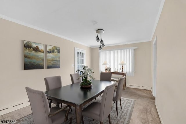 carpeted dining space featuring baseboards, baseboard heating, and crown molding