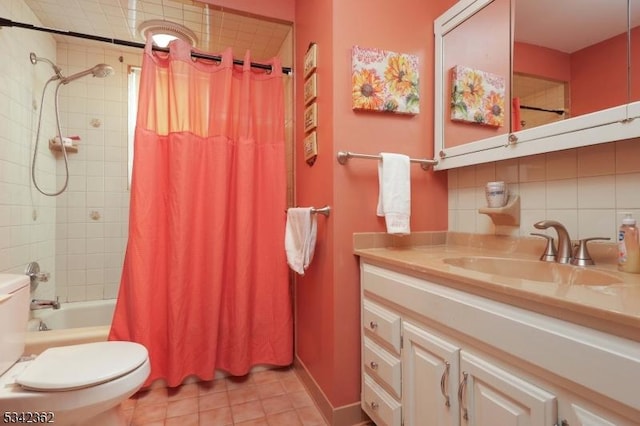 full bathroom featuring toilet, vanity, decorative backsplash, tile patterned floors, and shower / bath combination with curtain