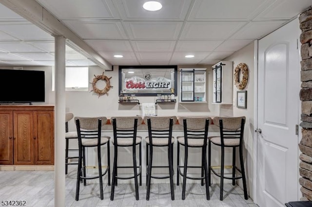 bar featuring recessed lighting and wet bar