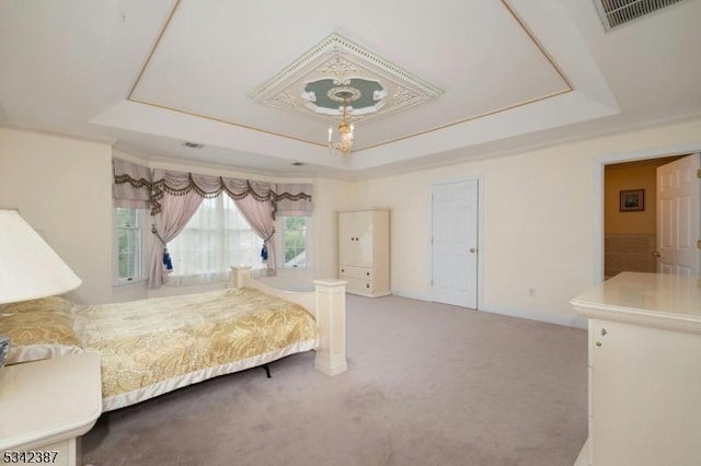 unfurnished bedroom featuring carpet, a raised ceiling, visible vents, and crown molding