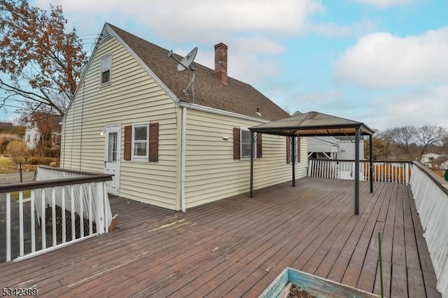 wooden terrace with a gazebo