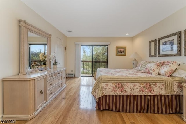 bedroom featuring access to exterior, multiple windows, visible vents, and light wood finished floors