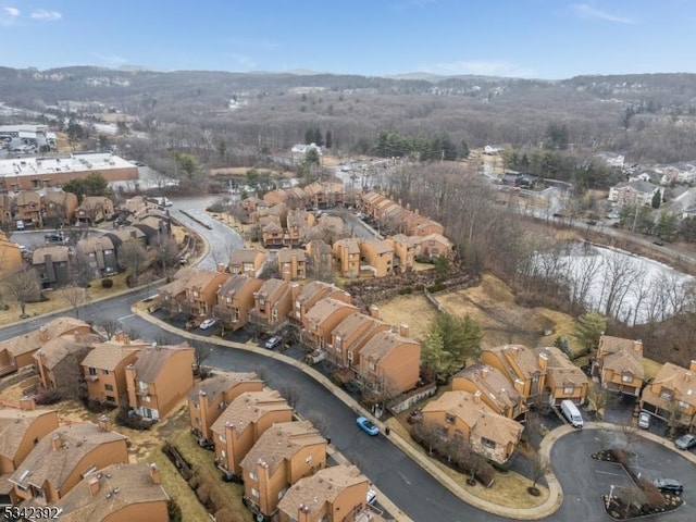 birds eye view of property with a residential view