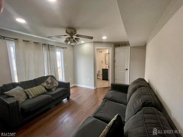 living room with recessed lighting, visible vents, ceiling fan, wood finished floors, and baseboards