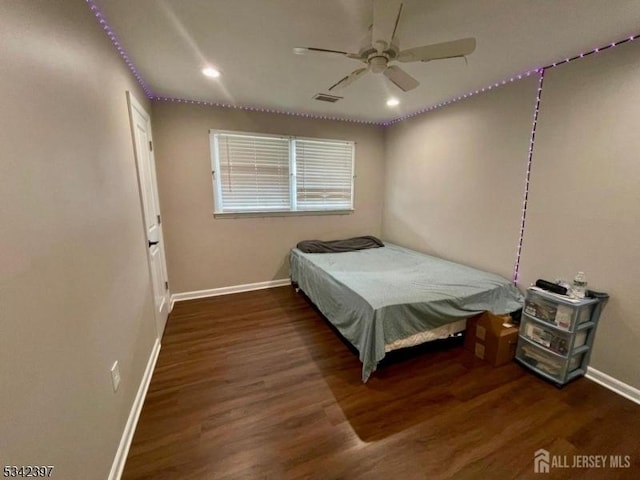 bedroom featuring recessed lighting, wood finished floors, visible vents, and baseboards