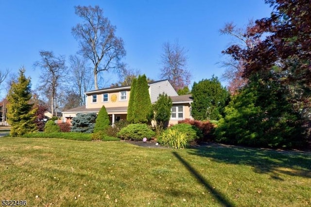 view of front of home with a front yard