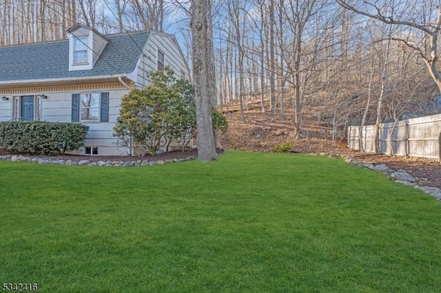 view of yard featuring fence