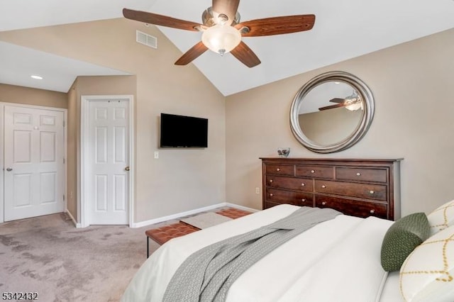 bedroom with carpet flooring, a ceiling fan, visible vents, vaulted ceiling, and baseboards