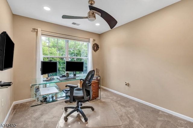 carpeted office with visible vents, baseboards, a ceiling fan, and recessed lighting