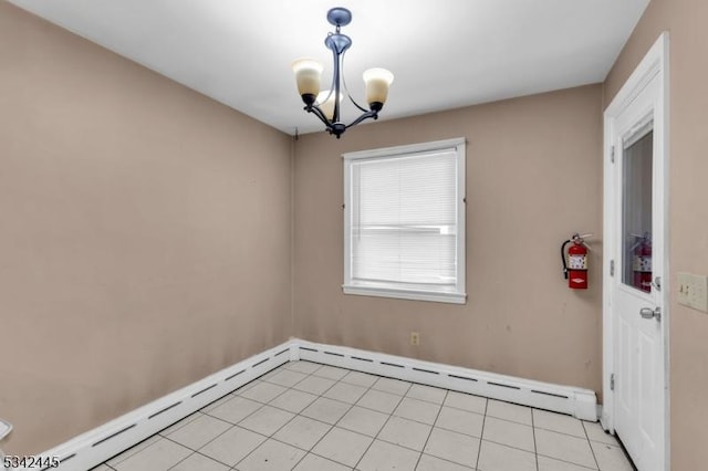 unfurnished room with light tile patterned floors, a chandelier, and baseboard heating