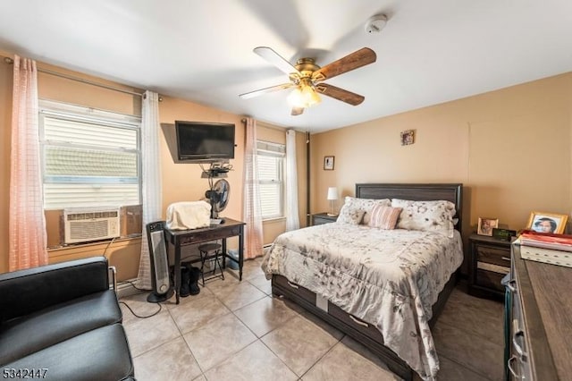 bedroom featuring a ceiling fan and light tile patterned flooring