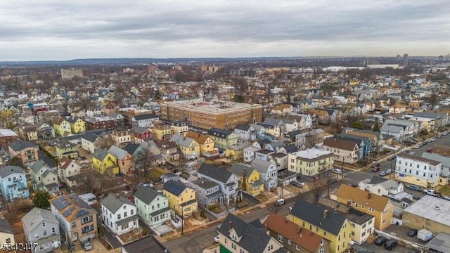 birds eye view of property with a residential view