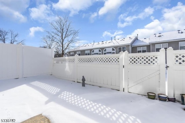 exterior space with a gate, a patio area, and fence