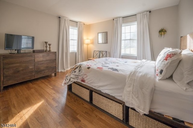 bedroom featuring wood finished floors