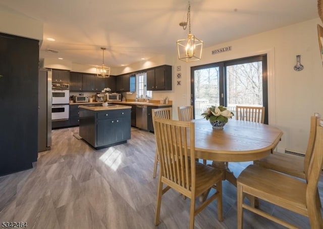 dining area with recessed lighting