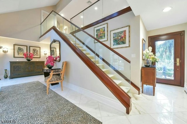 stairs featuring visible vents and baseboards