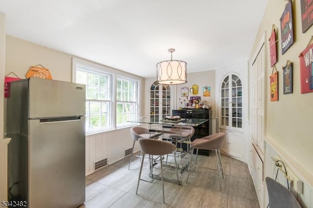 dining space featuring visible vents