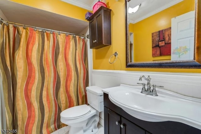 bathroom featuring toilet, vanity, wainscoting, a shower with curtain, and crown molding