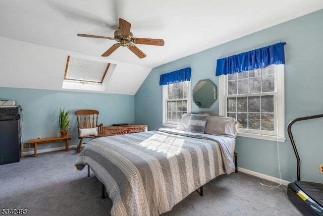 bedroom featuring lofted ceiling, carpet, a ceiling fan, and baseboards