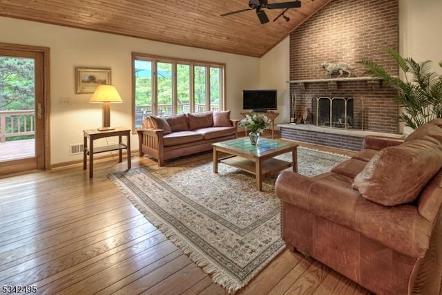 5 Apgar Way, Tewksbury Twp, NJ 08833 - living room with ceiling fan, wood ceiling, plenty of natural light, hardwood / wood-style floors, and a brick fireplace