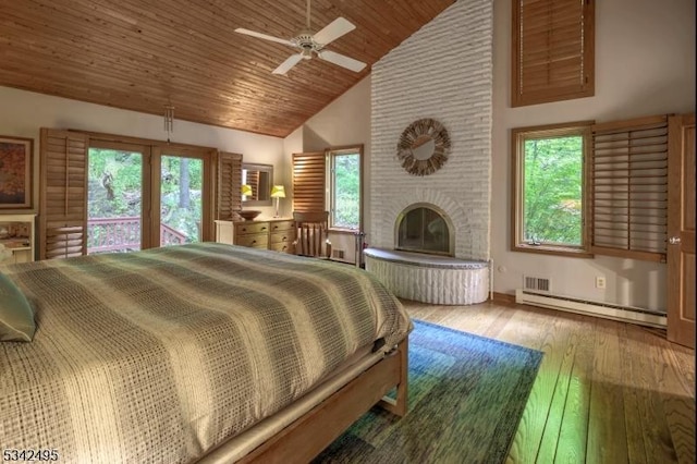 5 Apgar Way, Tewksbury Twp, NJ 08833 - bedroom featuring baseboard heating, a brick fireplace, high vaulted ceiling, hardwood / wood-style floors, and multiple windows