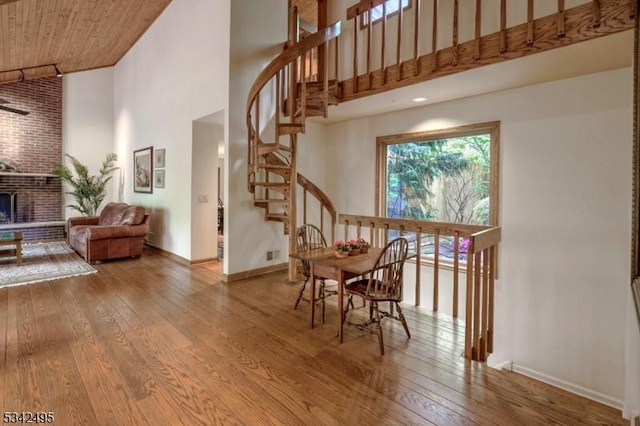 5 Apgar Way, Tewksbury Twp, NJ 08833 - dining area featuring a towering ceiling, hardwood / wood-style flooring, stairs, baseboards, and wooden ceiling